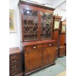 LATE GEORGIAN CUPBOARD BASE BOOKCASE, inlaid mahogany twin cupboard base 2 frieze drawers and glazed