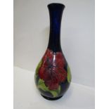 MOORCROFT, blue ground "Hibiscus" pattern 13" baluster vase with "Late Queen Mary" paper label