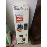 ADVERTISING, wall mounted Chocolate dispenser "Cadburys Fruit and Nut Milk Chocolate", 30" height 9"