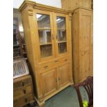 PINE DOUBLE BOOKCASE, waxed pine double cupboard base glazed bookcase, ornate escutcheons, 78"