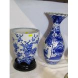 JAPANESE UNDERGLAZE BLUE, 8.5" jardinere decorated with long beaked birds in blossoming boughs (