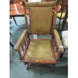 EDWARDIAN ROCKING CHAIR, American design beech framed rocking chair with brass studded leather