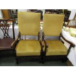 CAROLEAN DESIGN, pair of carved walnut open armchairs with crested and putti front rail, barley