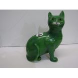 GALLE STYLE SMILING CAT, a green glazed porcelain seated Cat figure, 9" height