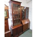 19TH CENTURY MAHOGANY BOOKCASE, inlaid glazed top with later added double cupboard base, maximum