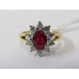 18ct YELLOW GOLD RUBY & DIAMOND CLUSTER RING, principal oval cut ruby, approx 1.5ct, surrounded by