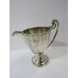 SILVER PEDESTAL CREAM JUG, facetted body with scroll handle, Sheffield 1929, 189 grams