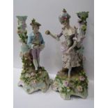 19th CENTURY CONTINENTAL PORCELAIN, pair of Thuringian figure base candle holders decorated with