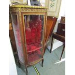 FRENCH DESIGN VITRINE, bow fronted with pierced gilt metal marble topped gallery, bow fronted