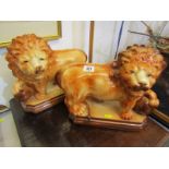STAFFORDSHIRE POTTERY, pair of octagonal based standing Lions, glass inset eyes, 11" height