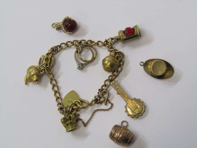 9ct YELLOW GOLD CHARM BRACELET and charms, combined weight approx 22.5 grams, charms including top