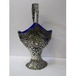 ORNATE SILVER SWING HANDLED BASKET, blue glass liner with embossed and fretwork body, 9" height,