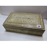 MOROCCAN INLAID CASKET, mother of pearl and bone inlaid rectangular casket, with busy geometric