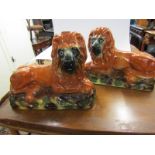 STAFFORSHIRE POTTERY, pair of seated pottery Lions, glass inset eyes, 10" height