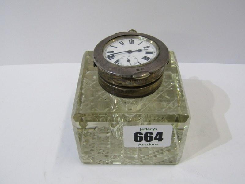 WATCH LIDDED CUT GLASS INK WELL, a novel silver mounted cut glass ink well with inset watch lid,