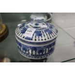 A Chinese blue and white circular porcelain box and cover.