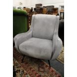 Marco Zanusso, a stylish upholstered armchair on tubular steel legs.