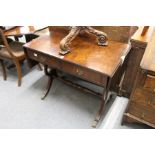 A reproduction burr wood sofa table.