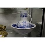 A blue and white jug and bowl.