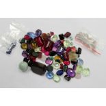 A group of mixed gemstones.