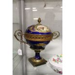A continental porcelain and ormolu bowl and cover.