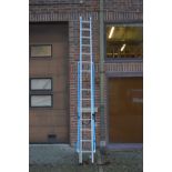 An aluminium extending ladder.