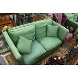 A good large two seater Knoll settee upholstered in a green watered silk style fabric.