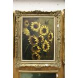 A study of sunflowers, oil on board, decoratively framed.