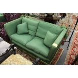 A good large two seater Knoll settee upholstered in a green watered silk style fabric.