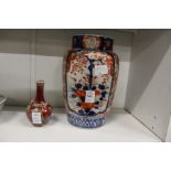 An Imari vase and a small Chinese bottle vase.