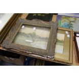 A decorative gilt frame and a pair of prints.