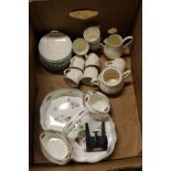 A Coalport strawberry dish with sugar bowl and cream jug and a polka dot decorated coffee set.