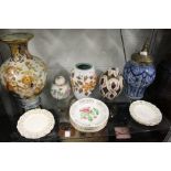 A collection of porcelain items to include ginger jars and covers, blue and white temple jar etc.