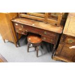 A 19th century mahogany kneehole side table.