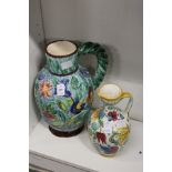 Two continental pottery jugs.