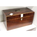 A George III mahogany tea caddy with fitted interior.