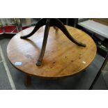 A good large pine circular coffee table.