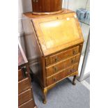 A small walnut bureau.