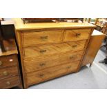 A Victorian satin walnut chest of drawers.