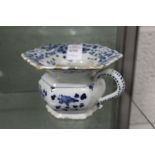A 19th century blue and white decorated porcelain personal spitoon.
