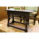 An Elizabethan style oak joynt stool.