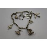 A small silver charm bracelet.