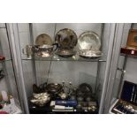 A large quantity of silver plate and pewter items.