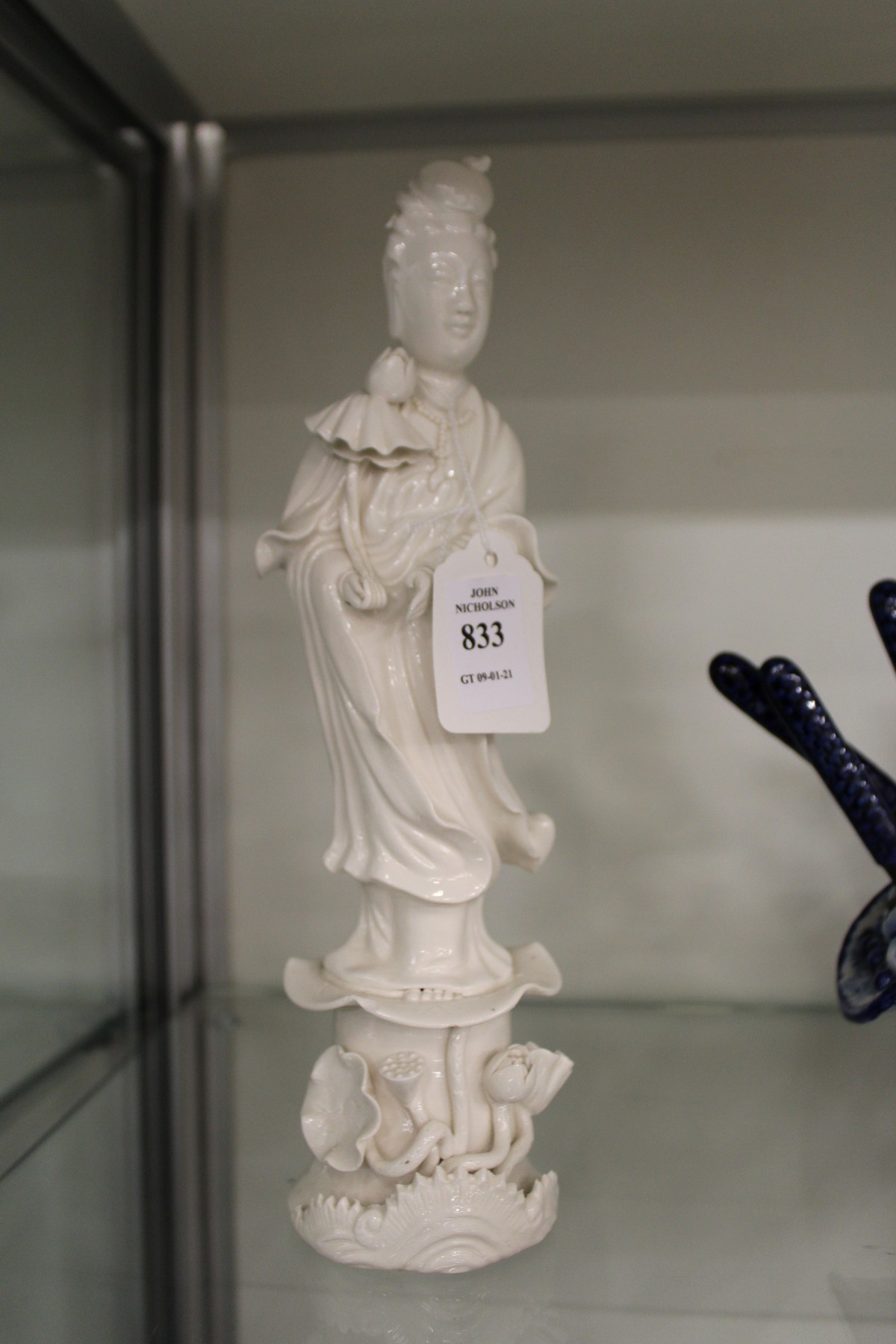 A Chinese blanc-de-chine figure of Guanyin.