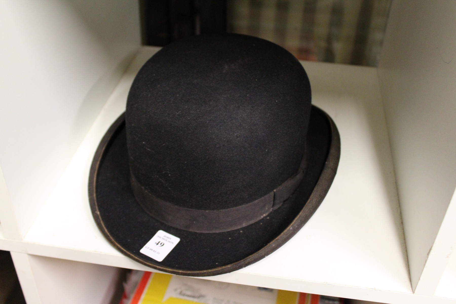 An Austin Reed bowler hat.