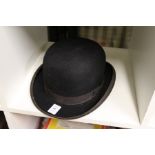 An Austin Reed bowler hat.