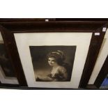 A set of three large portrait engravings in moulded wood frames.