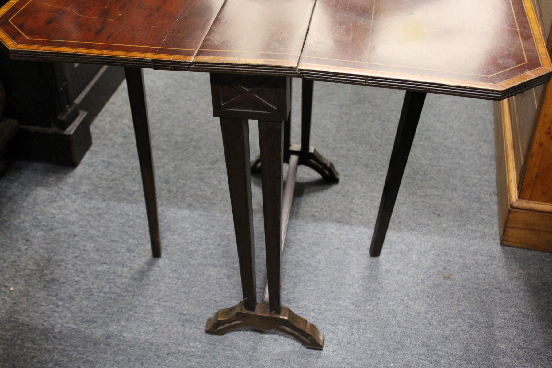 An Edwardian inlaid mahogany Sutherland table. - Image 2 of 2