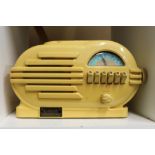 A Bakelite style radio / cassette player.