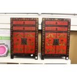 A pair of Chinese decorative lacquer small cabinets with two drawers and two cupboard doors.